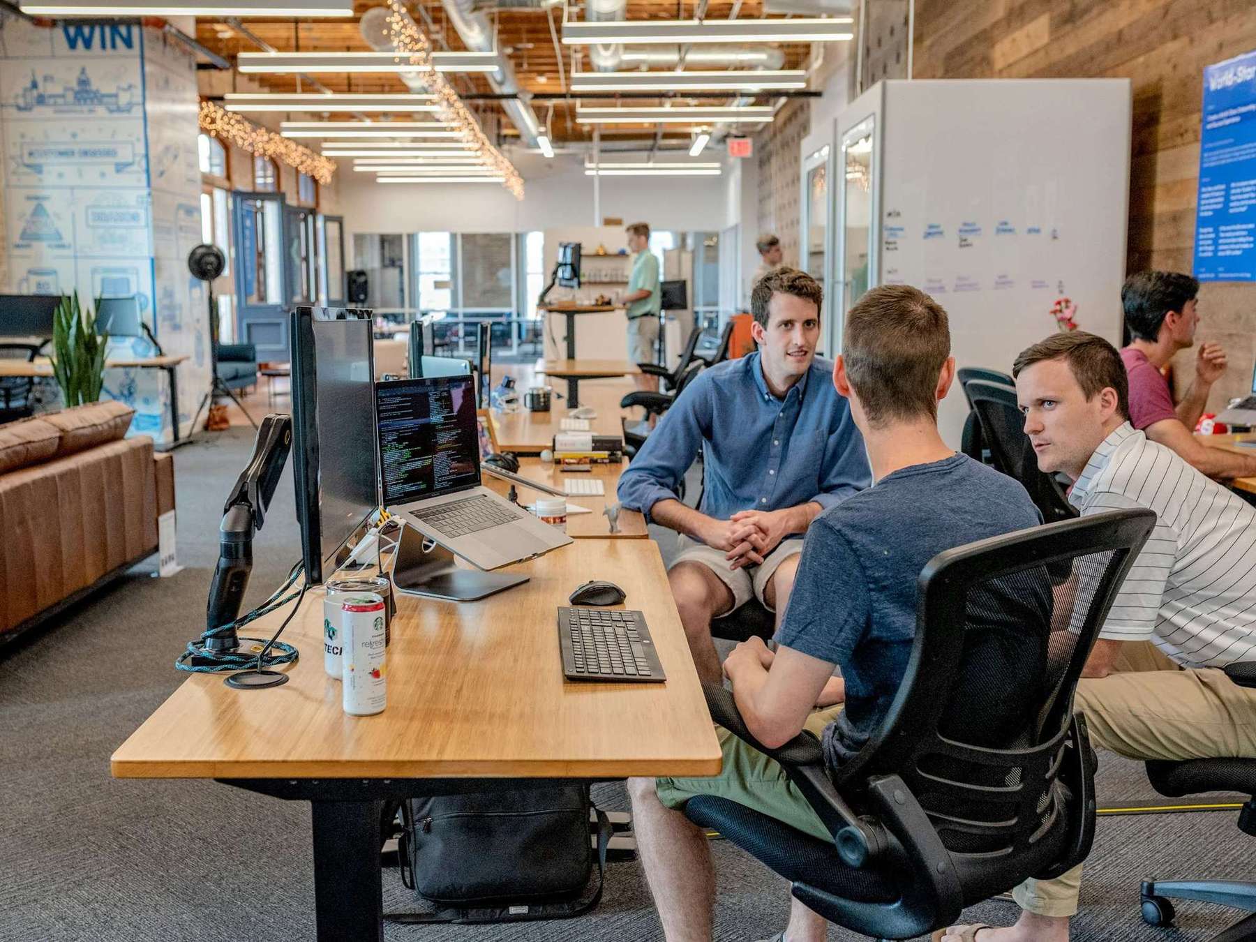 Open-plan business office with staff at their desks